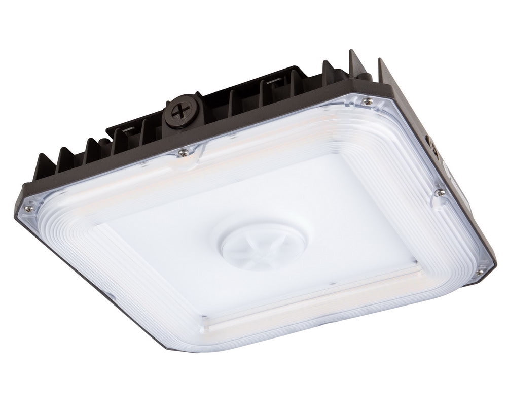 Bottom angled view of the NCLTG CanoLux Series LED Canopy Light showcasing its sleek, durable design