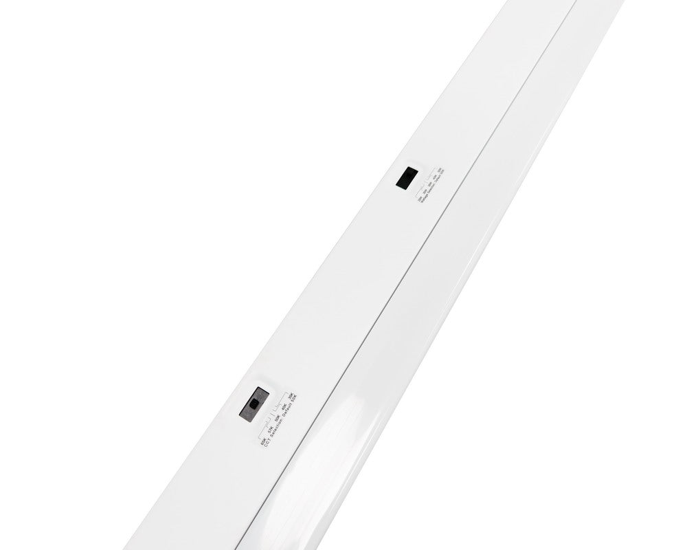Up-close view of 8-Foot NCLTG LineVolt Series LED Strip Light displaying wattage and CCT selectable DIP switches for easy field adjustments