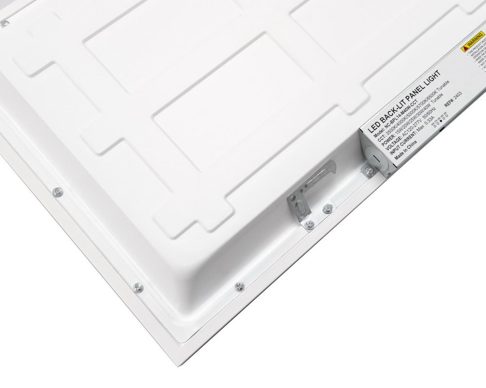 Back corner view of NCLTG SkyLine Series 1x4 LED Panel Light showing grid clips and integrated driver for secure installation and easy wiring access