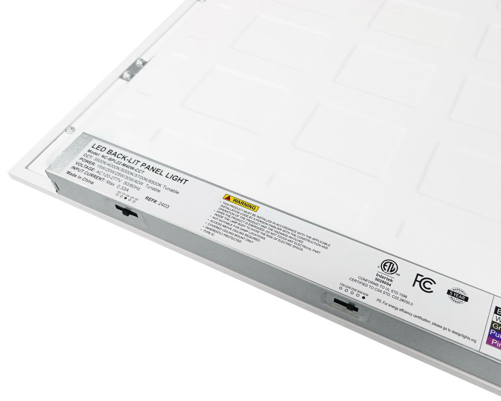 Close-up back view of NCLTG SkyLine Series 2x2 LED Panel Light showing driver with wattage and CCT selectable DIP switches for field adjustment