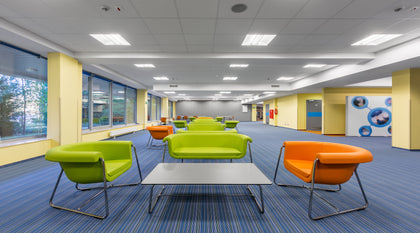 LED light bulbs installed in commercial ceiling fixtures for high-efficiency, long-lasting lighting in retail and office environments