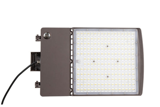 Bronze GridMax Series LED Area Light side view showing the bottom lens and attached power cable