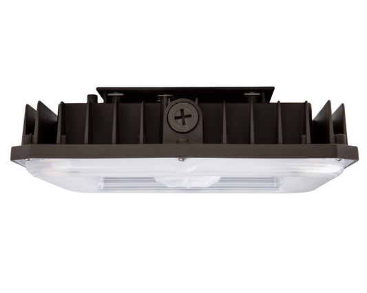 Side view of the NCLTG CanoLux Series LED Canopy Light showing the polycarbonate lens and knockout point for streamlined installation