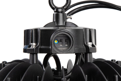 Detailed view of the NCLTG Halo X Series LED UFO High Bay Light showing wattage and CCT selectable DIP switches for customizable lighting settings
