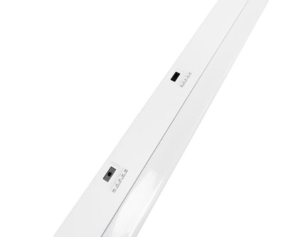 Up-close view of 8-Foot NCLTG LineVolt Series LED Strip Light displaying wattage and CCT selectable DIP switches for easy field adjustments