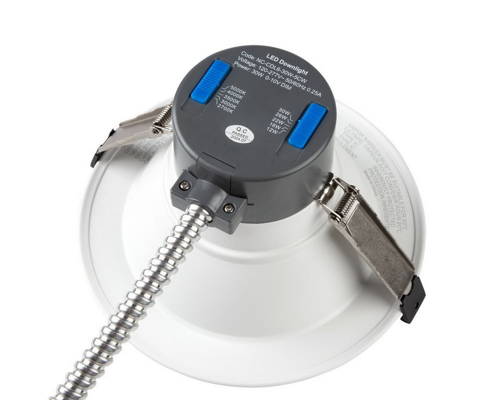 NCLTG RecessEdge Series 6-inch LED commercial downlight top view showing mounting clips, MC cable, and wattage/CCT selectable slide switches for customizable settings