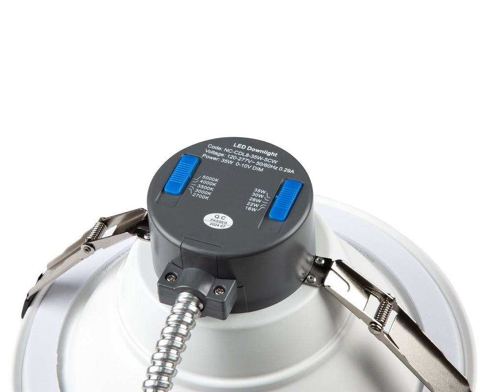 NCLTG RecessEdge Series 8-inch LED commercial downlight top detailed view showing wattage and CCT selectable slide switches for on-site customization