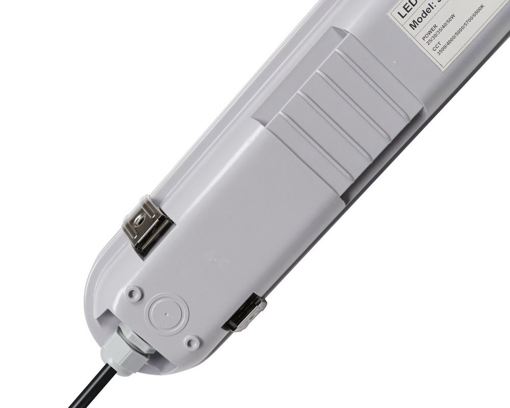 Close-up back view of the NCLTG StormGuard Series 4-Foot LED Vapor Tight Light showing the knockout and connected power cable